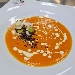 -Crema di zucca servita con porro piastrato, fonduta al pecorino sardo e terra di cipolla - -