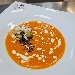 -Crema di zucca servita con porro piastrato, fonduta al pecorino sardo e terra di cipolla - -