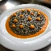 -Fregola al nero di seppia con sferificazione di zucca al lime - -