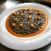 -Fregola al nero di seppia con sferificazione di zucca al lime - -