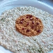 -Risotto con crema di gorgonzola, salmone e lime servito con bottarga e melograno - -