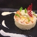 -Risotto mantecato al gorgonzola con carpaccio di gamberi marinati al mojito  - 80 gr Riso Carnaroli,
20 gr di gorgonzola ,
40 gr gamberi,
menta q.b.,
5 ml rhum bianco, 
zucchero di canna q.b.,
lime q.b.
PROC.: il primo passaggio e' pulire i gamberi (mazzancolle) levandogli il carapaceo e le interiora; si incidono sul dorso e con l' aiuto della pellicola si da' un colpetto leggero con il batticarne per schiacciarli; mettere il gambero nella marinatura del mojito.
A parte iniziamo a cuocere il riso (senza alcun fondo di burro, olio e cipolla), mettendolo in una casseruola incandescente e aggiungendo poco per volta il brodo vegetale. Portato a cottura il riso, viene mantecato con il gorgonzola. Adesso viene la parte piu' divertente nel comporre il piatto esteticamente, mettere il riso in un coppapasta e lasciarlo per 10 secondi, il tempo necessario per farlo rassodare, poi proseguiamo con l' aggiungere il carpaccio di gamberi, poi una quenelle di gorgonzola ed infine la mentuccia come ultimo elemento decorativo 