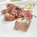 -Tataki di tonno, emulsione olio extravergine di oliva e limone, sale nero. Terra di the verde con dadini di mela verde. Giardino zen di patata agrumata con uova di salmone, pesce volante, uova di caviale, fiori e shiso.  - -Chef Paolo Gramaglia