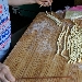 Busiati con tonno sott'olio di tonnara, zucchine,  pomodorini di Pachino e petali di mandorle di Avola fotografia di Mirko Gagliardi - -