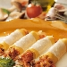 Cannelloni di pasta fresca con salsiccia e funghi finferli - -