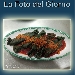 Caramelle di pasta all'alga spirulina senza glutine e lattosio con baccal mantecato e parate ai peperoni cruschi, su rosso pomodoro e crumble di tarallo senza glutine - -