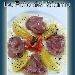 Carpaccio di ananas con tonno marinato e spicchi di arance - -