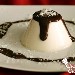 Dessert - tortino di panna cotta con salsa cioccolata calda - 