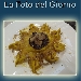 Girasole allo zafferano di Ripacandida e cacao ripieno di ricotta podolica e tartufo  estivo, con scaglie di funghi porcini trifolati e noci - -