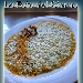 Risotto con crema di ricotta sarda al lime, salmone affumicato e melograno - -