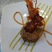 Tournedos di vitello con gambero, bacon su crema di piselli e bisque  - -