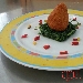 Arancini vegetariani con agretti segnati all'agro - -