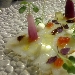 Carpaccio di baccal con petali di cipolla, smetana, uova di salmone fresche, salsa di soia, gelatina di alloro e germogli di crescione - -