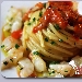 Spaghetti con ricci e gamberi - -