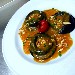 -Ravioli al nero di seppia ripieni di dentice con salsa alle mandorle - -