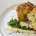 Tortino di baccal e patate foderato in pasta strudel con salsa mornay e aromi metiterranei - -